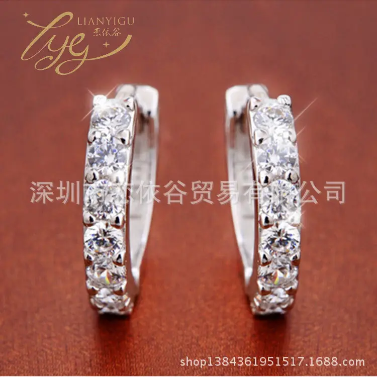 Joker-Inspired Zircon Earrings Gold Tone