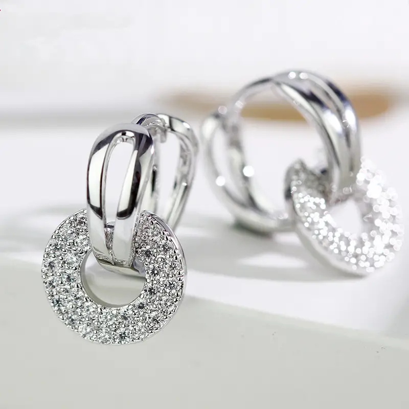 Joker-Inspired Zircon Earrings Gold Tone