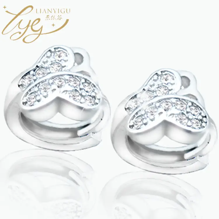 Joker-Inspired Zircon Earrings Gold Tone