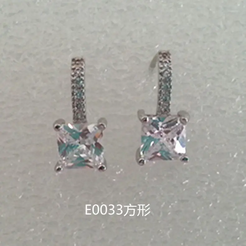 Joker-Inspired Zircon Earrings Gold Tone