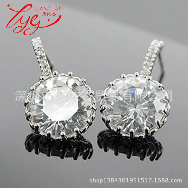 Joker-Inspired Zircon Earrings Gold Tone
