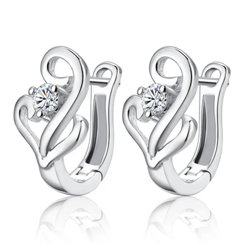 Joker-Inspired Zircon Earrings Gold Tone