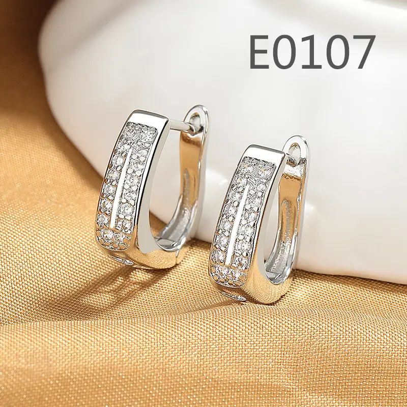 Joker-Inspired Zircon Earrings Gold Tone