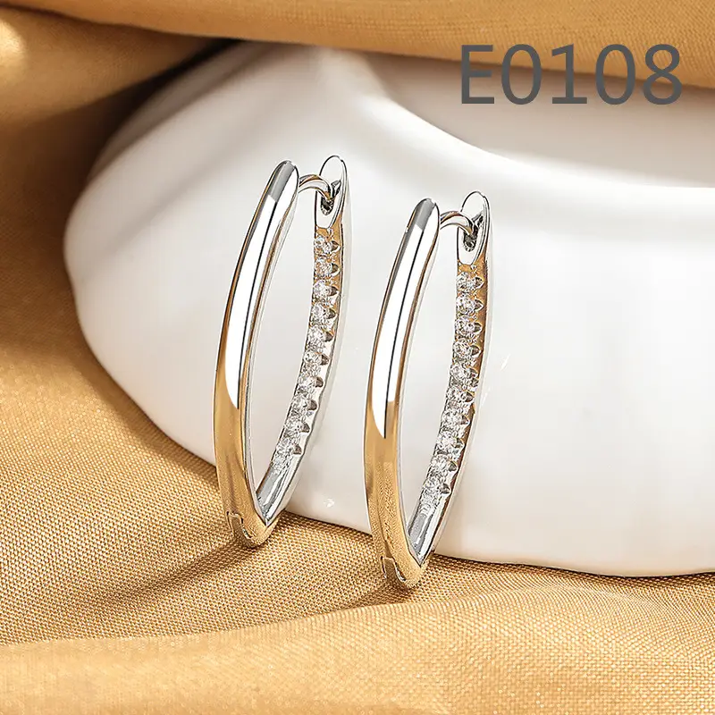 Joker-Inspired Zircon Earrings Gold Tone