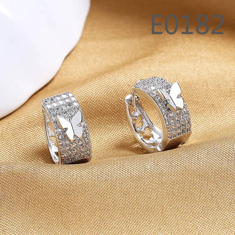 Joker-Inspired Zircon Earrings Gold Tone