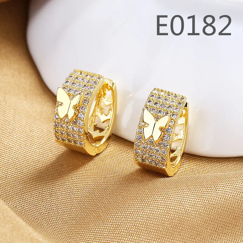 Joker-Inspired Zircon Earrings Gold Tone