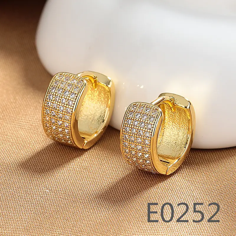 Joker-Inspired Zircon Earrings Gold Tone
